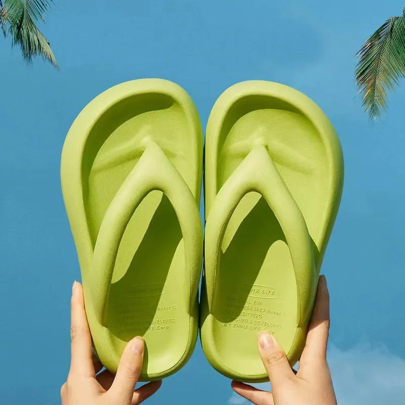 Solid colour thick-soled EVA flip-flops with a bow decoration on the upper.