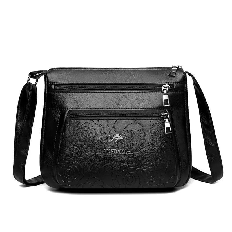 Black PU women's shoulder messenger bag with horizontal square shape, single strap, slit pocket, and phone bag