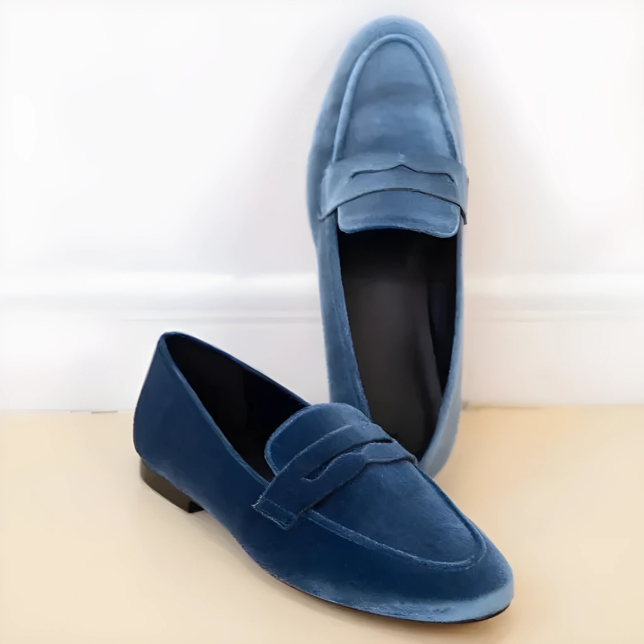 Blue and black women's suede-effect slip-on loafers with a round toe and rubber sole