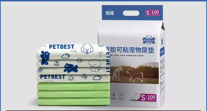 Pack of adhesive-backed dog urine pads showing sizes S, M, L, and XL with bamboo charcoal and lemon scent options