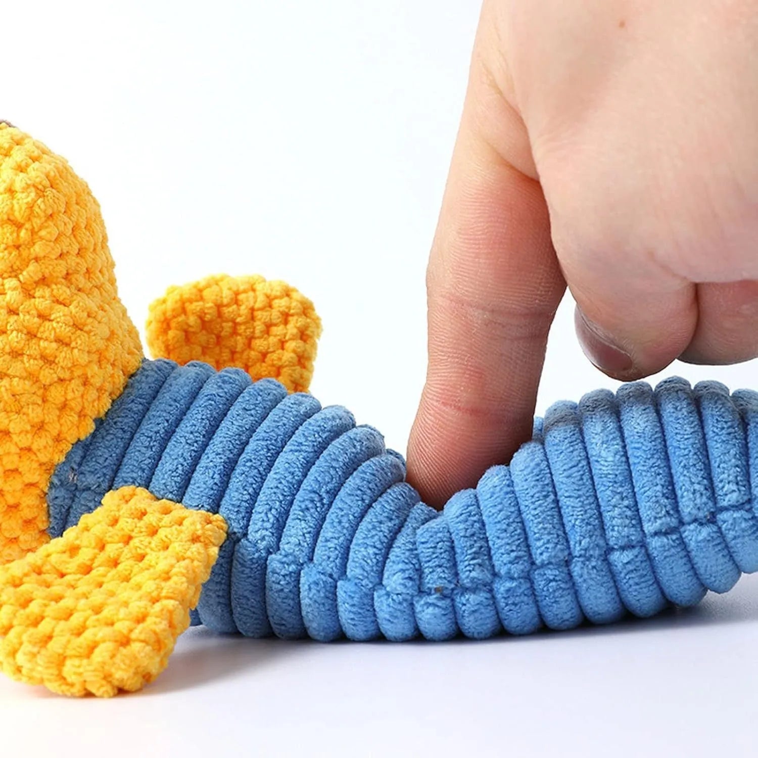 Squeaky plush dog chew toy in animal shapes for dental cleaning, size 19cm by 5cm