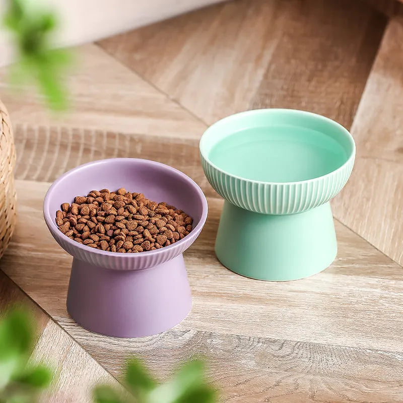 Striped oblique matte purple anti-tumble porcelain cat goblet rice bowl on a light background