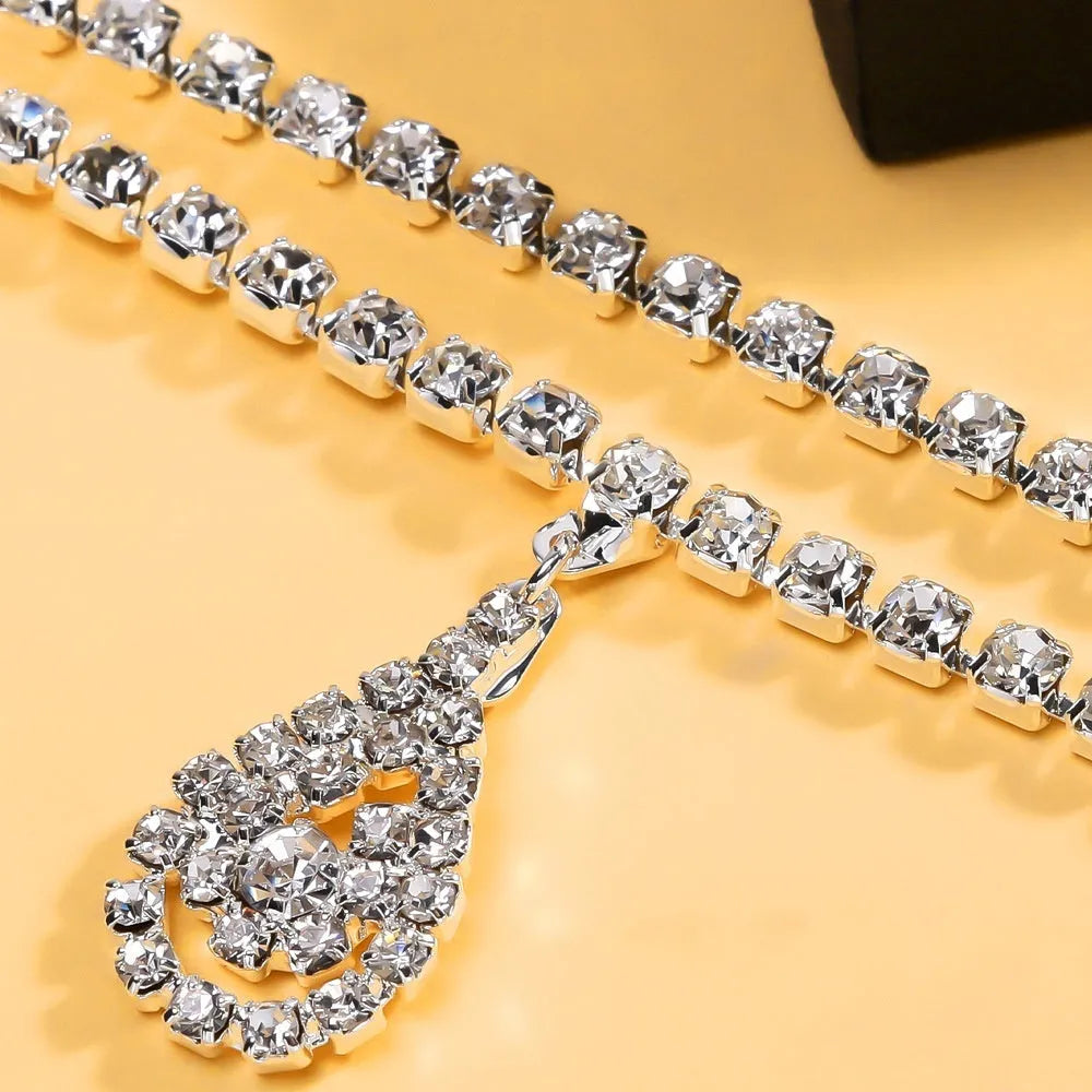 Women's water drop pendant waist chain in gold or silver colour with rhinestone decoration
