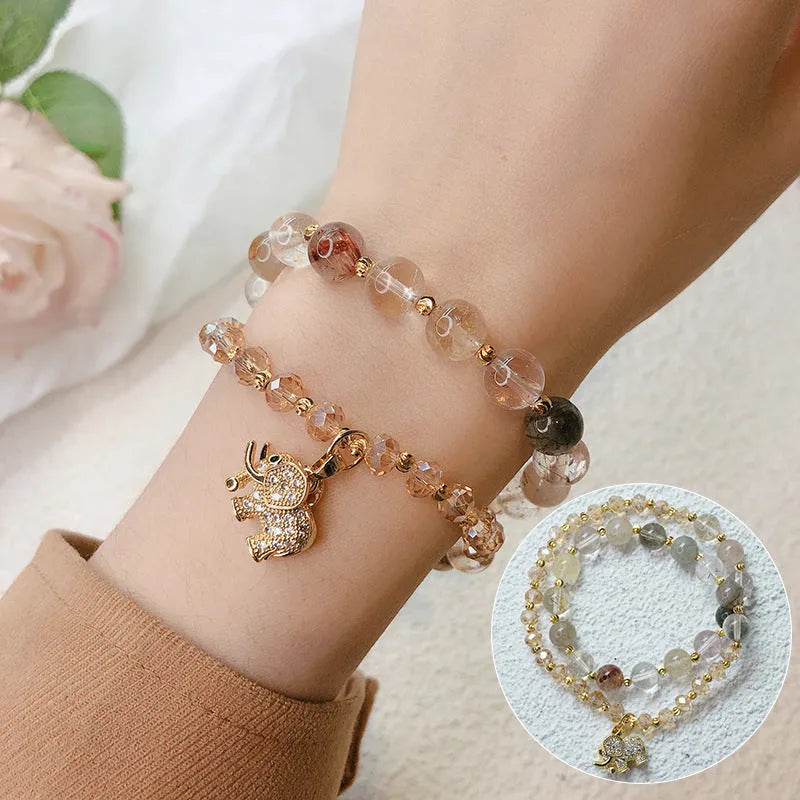 Retro style women's bracelet made with colour hair crystal and a strawberry quartz gemstone.