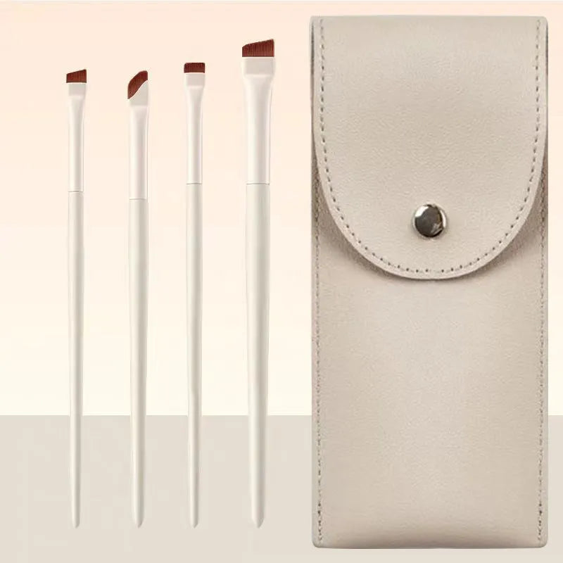 Four angled ultra-thin eyeliner and brow brushes in a leather case.