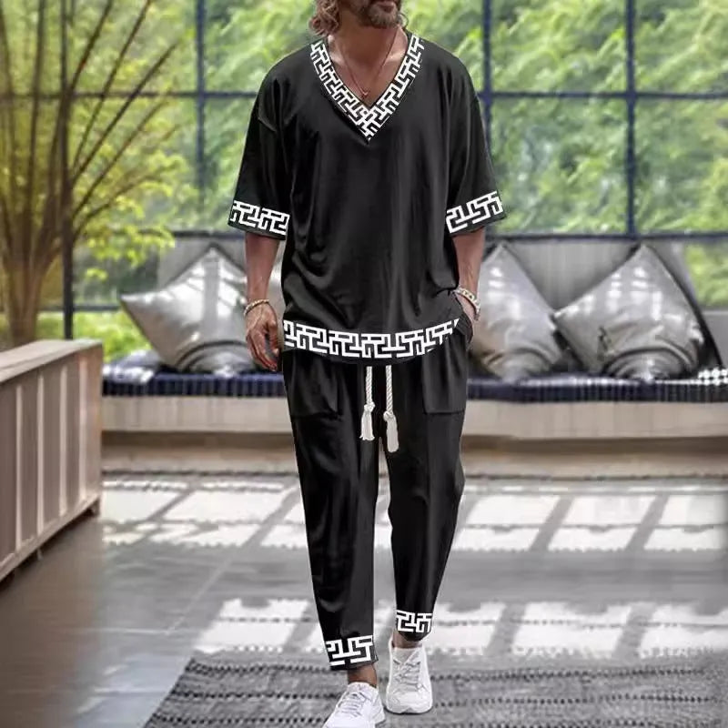 Trousers suit with V-neck jacket and cropped sleeves in thin polyester fabric
