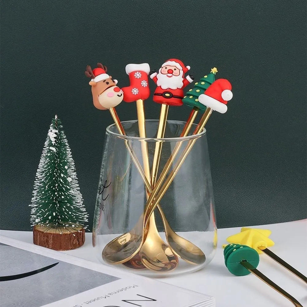 Stainless steel Christmas spoon and fork set with red handles and mirror-polished finish featuring Christmas tree and snowman patterns