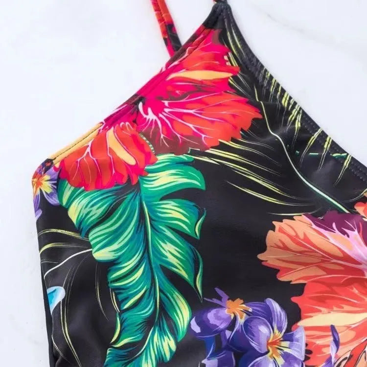 Black women's high waist briefs with printed split bikini style for swimming and sports.