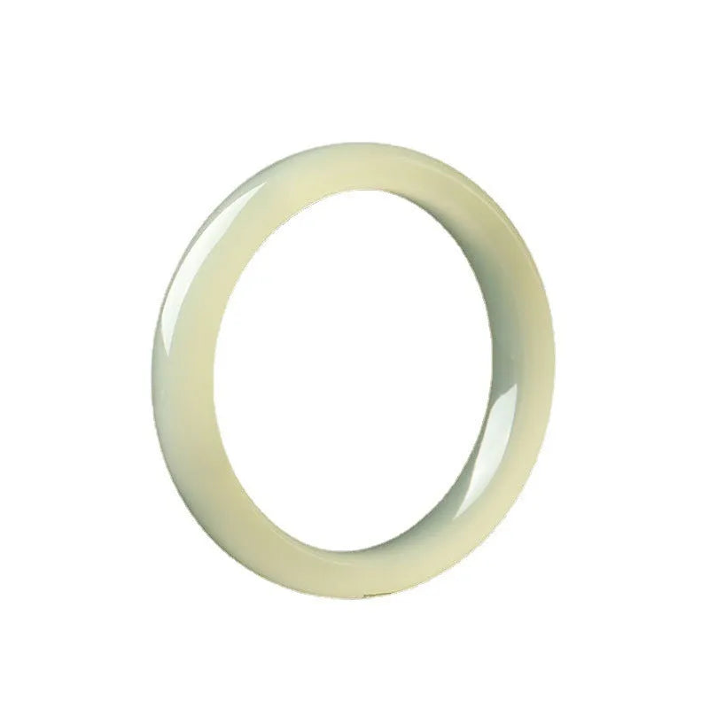 Adjustable winding bracelet made of round ice-like silk jade beads on a silk cord.