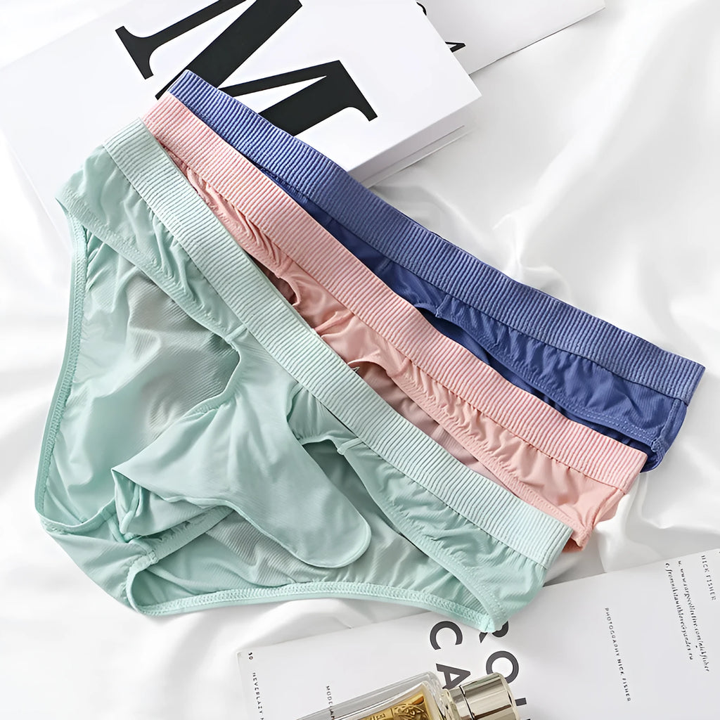 Men's low waist Ice Silk briefs in black, grey, purple blue, light green, and pink colour options.