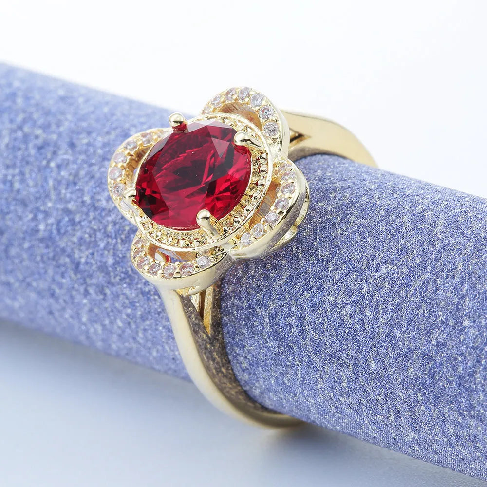 Copper ring with gold-tone electroplated finish featuring zircon stone fruit design