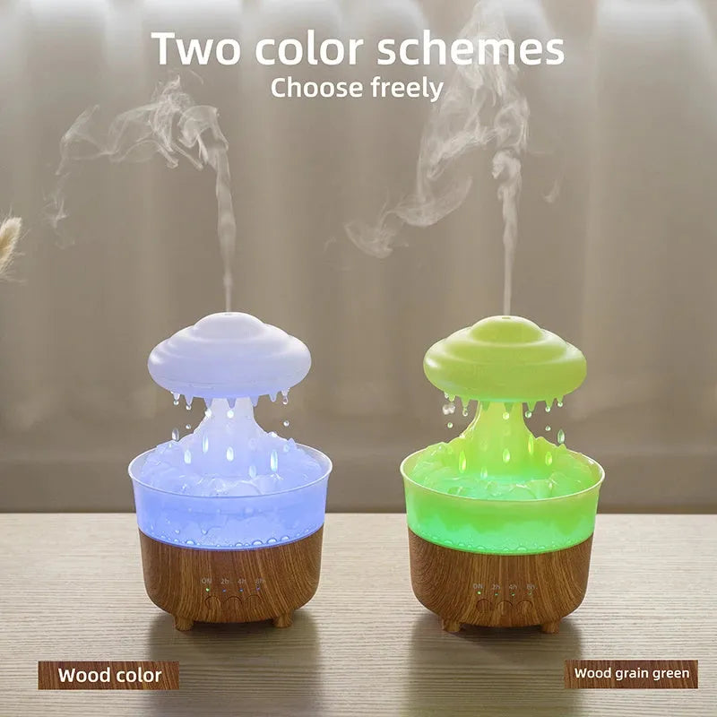 Wood grain white rain cloud shaped humidifier diffuser with coloured LED lights on a table