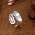 Adjustable open ring with geometric design and frosted sterling silver finish