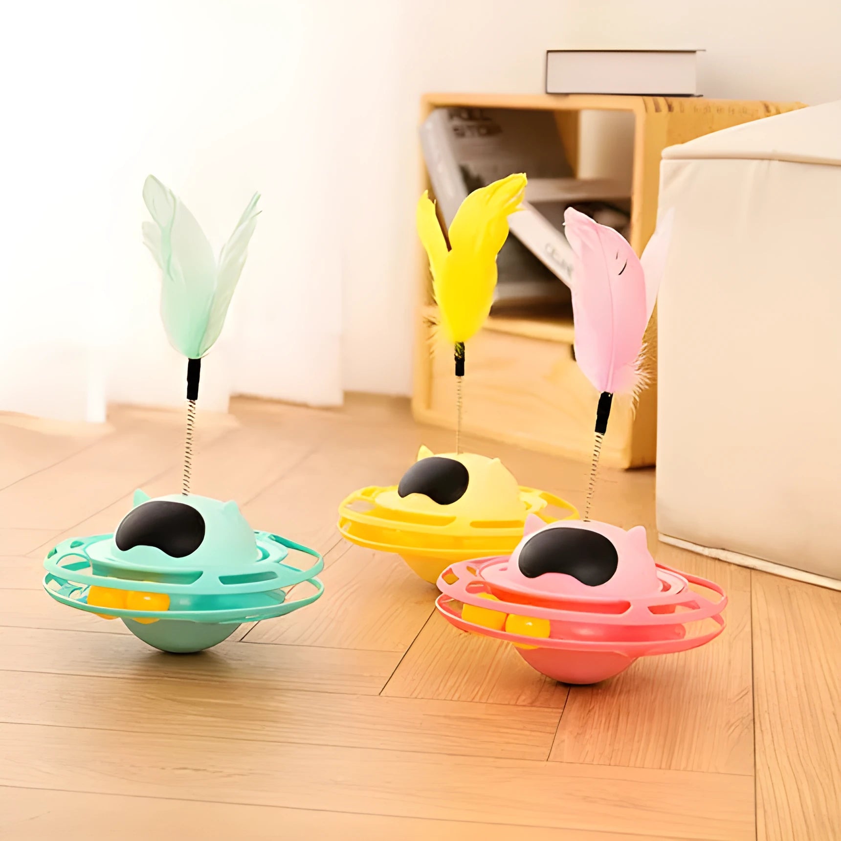 Pink plastic cat stick toy with turntable base measuring 17x10cm for kitten play