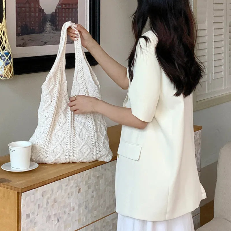 Retro hollow knitted polyester shoulder tote bag in large 55cm size with double straps.