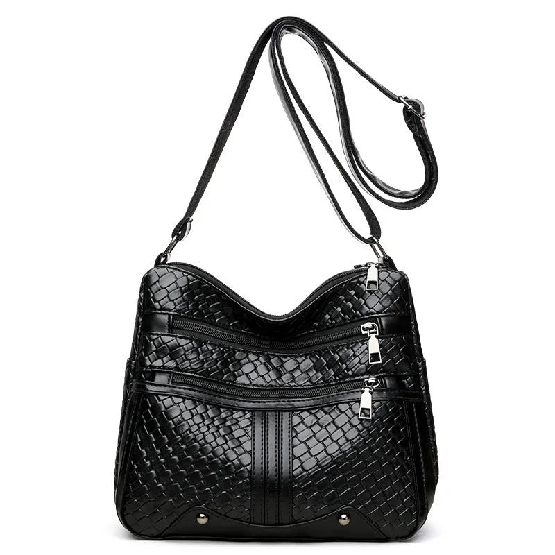 Woven PU messenger bag with multiple compartments showing zipper change bag section in brown colour