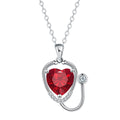 Women's fashion necklace with stethoscope, wings and cross design in red diamond colour