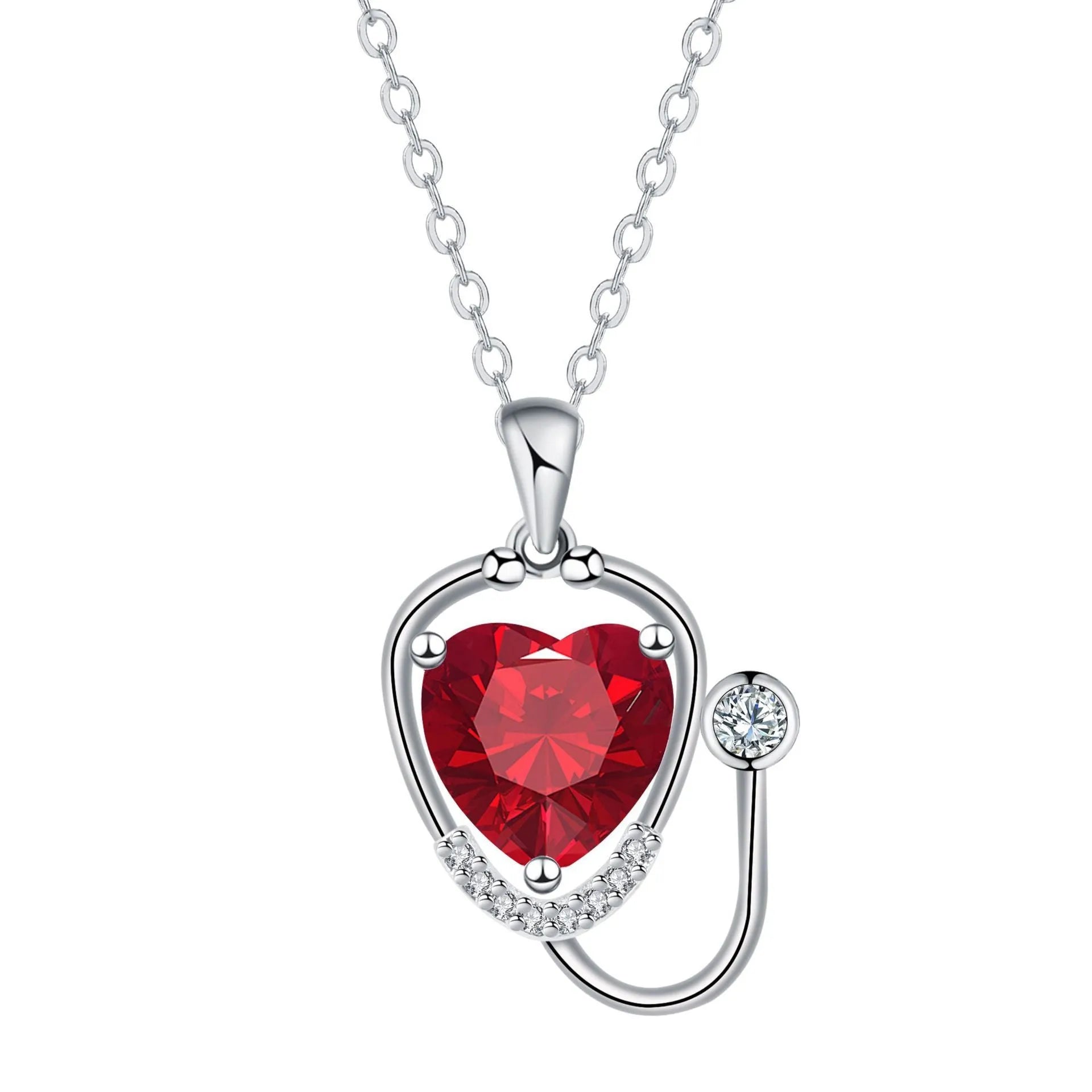 Women's fashion necklace with stethoscope, wings and cross design in red diamond colour