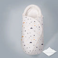 Cotton anti-startle swaddle blanket for babies in a colourful dinosaur print, 30 by 60 cm.