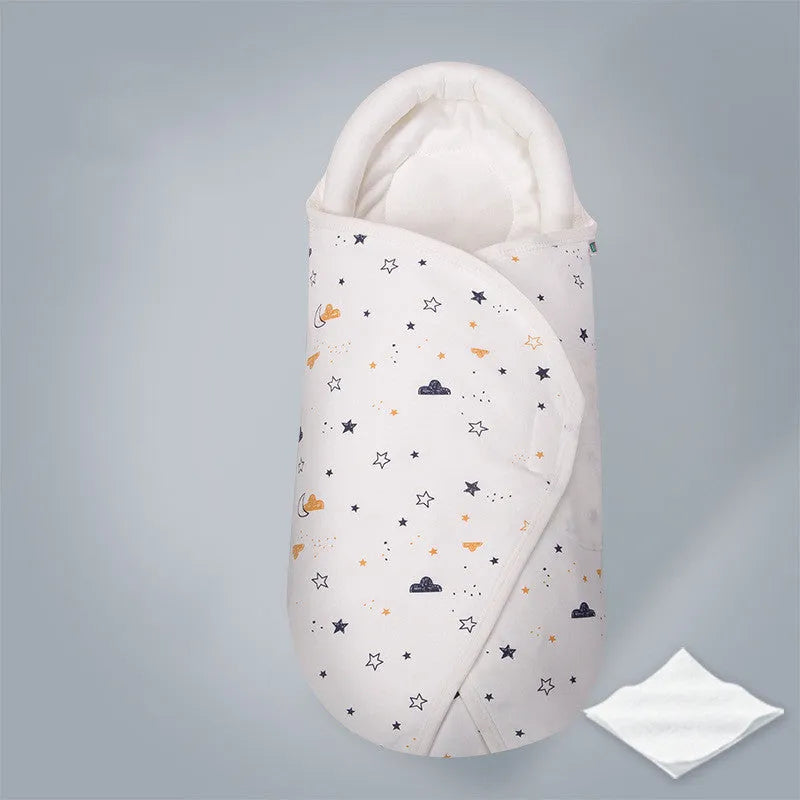 Cotton anti-startle swaddle blanket for babies in a colourful dinosaur print, 30 by 60 cm.