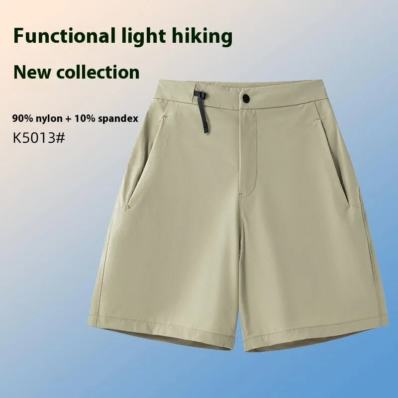 Men's quick-drying sports shorts in a solid colour with elastic waistband and 3D cut leg.