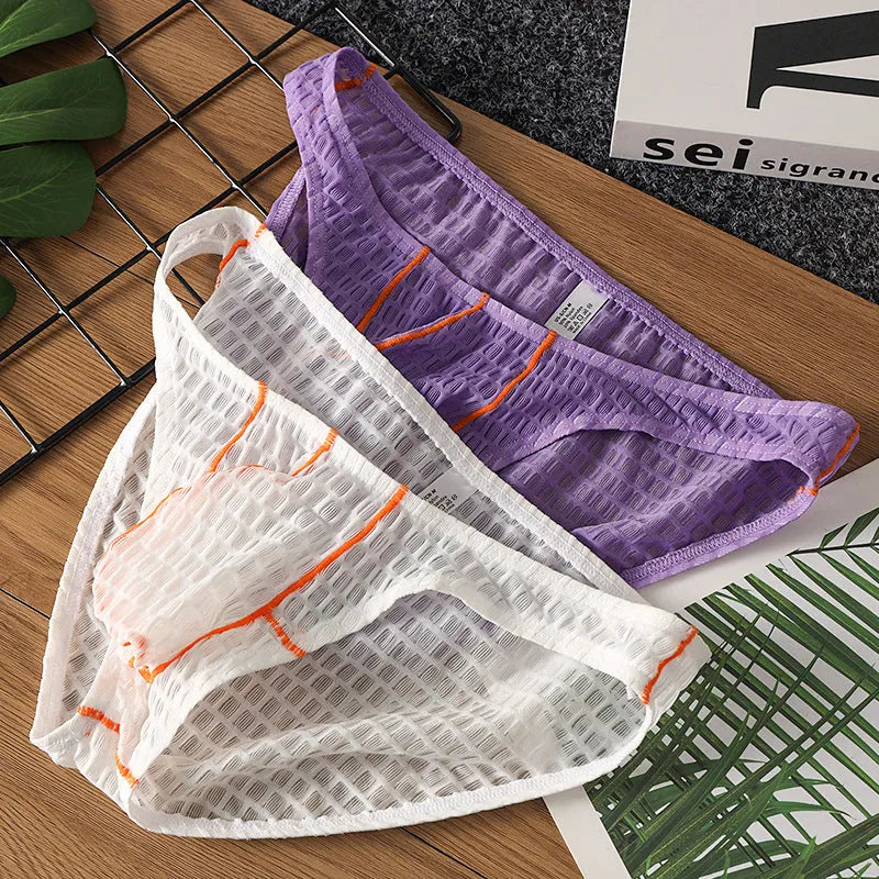 Men's low waist lace briefs in light purple on a white background