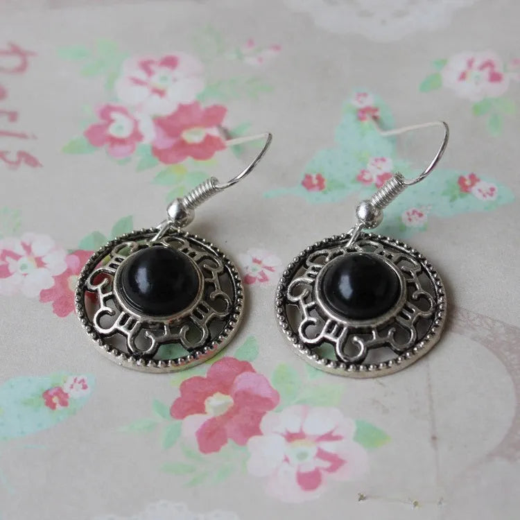 Miao silver retro turquoise flower disk earrings with geometric design in red, blue, and black colours