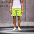 Men's loose straight cut workwear shorts in fluorescent green and army green colours
