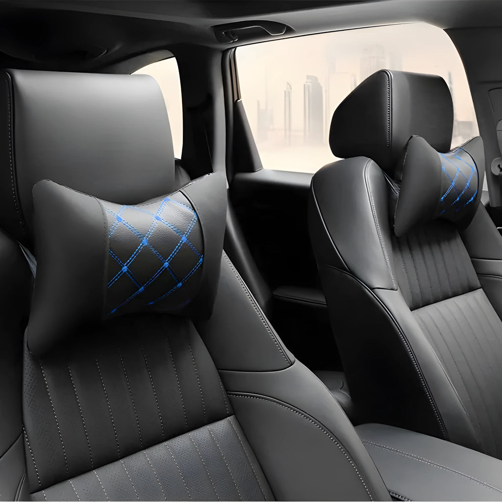 Black quilted diamond pattern car headrest cover with blue stitching, shown on a car seat.