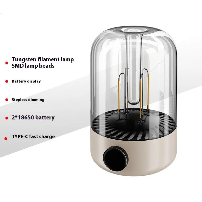 Beige camping ambience light with dual lamp beads, USB output, and analogue knob on a wooden table