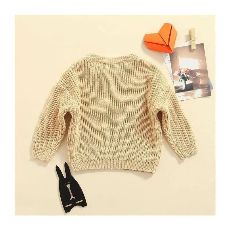 Girls' solid colour crew neck casual sweater in rabbit fur with star pattern, beige option, shown on child