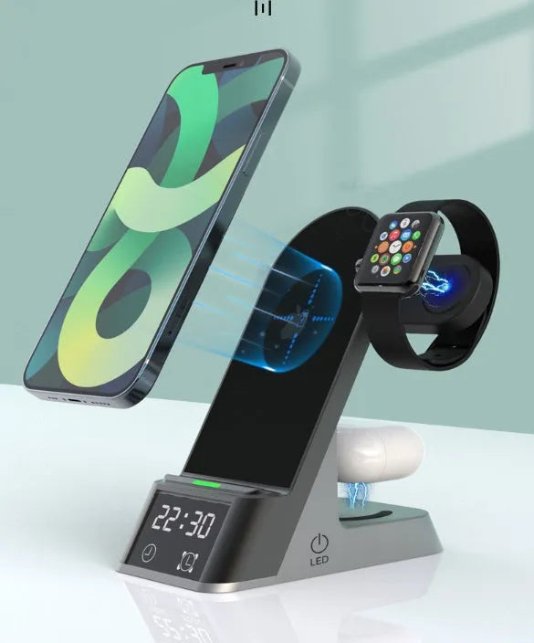 Black multifunctional alarm clock with digital display and wireless charging pad for phone, watch, and earbuds.