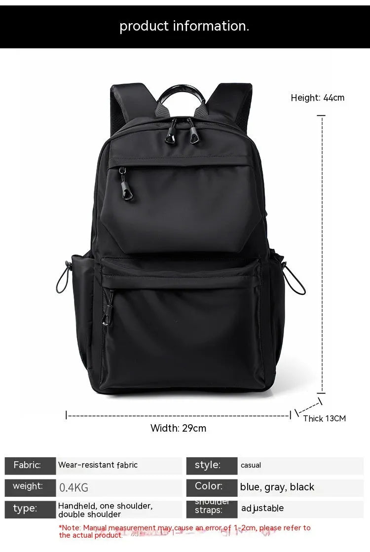 Blue Oxford cloth student backpack with anti-theft design and USB charging port, side view