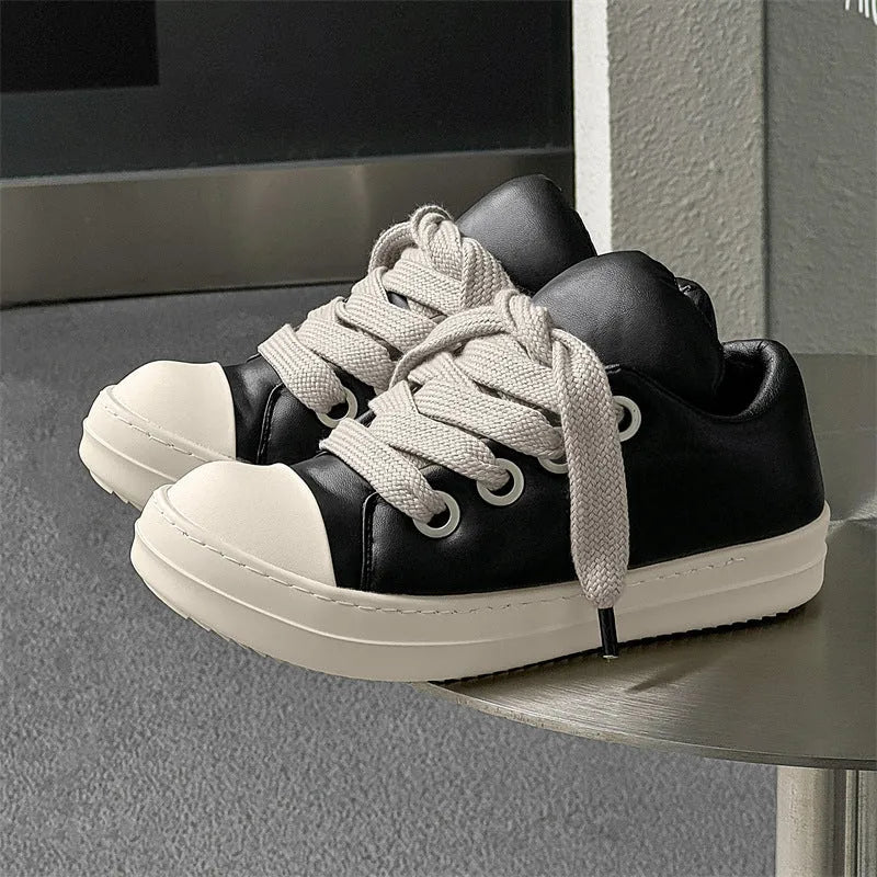 Men's black casual slip-on shoes with front lace-up and rubber sole