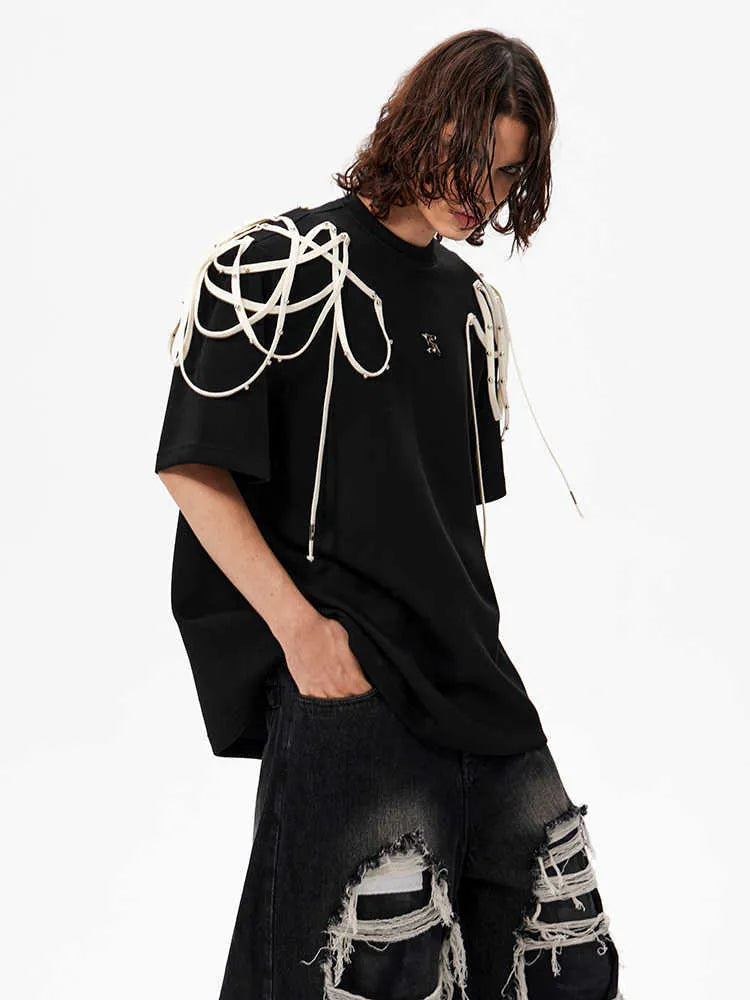 Black loose fit women's T-shirt with rivet ribbon padded shoulder detail and short sleeves