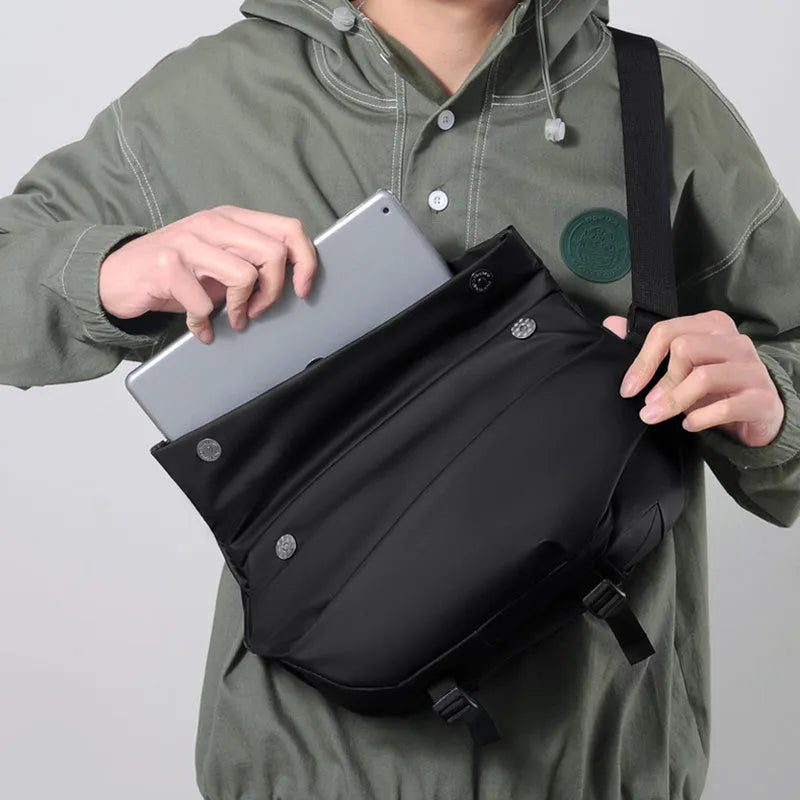 Men's medium crossbody shoulder bag in black or grey PU leather with internal organisation compartments