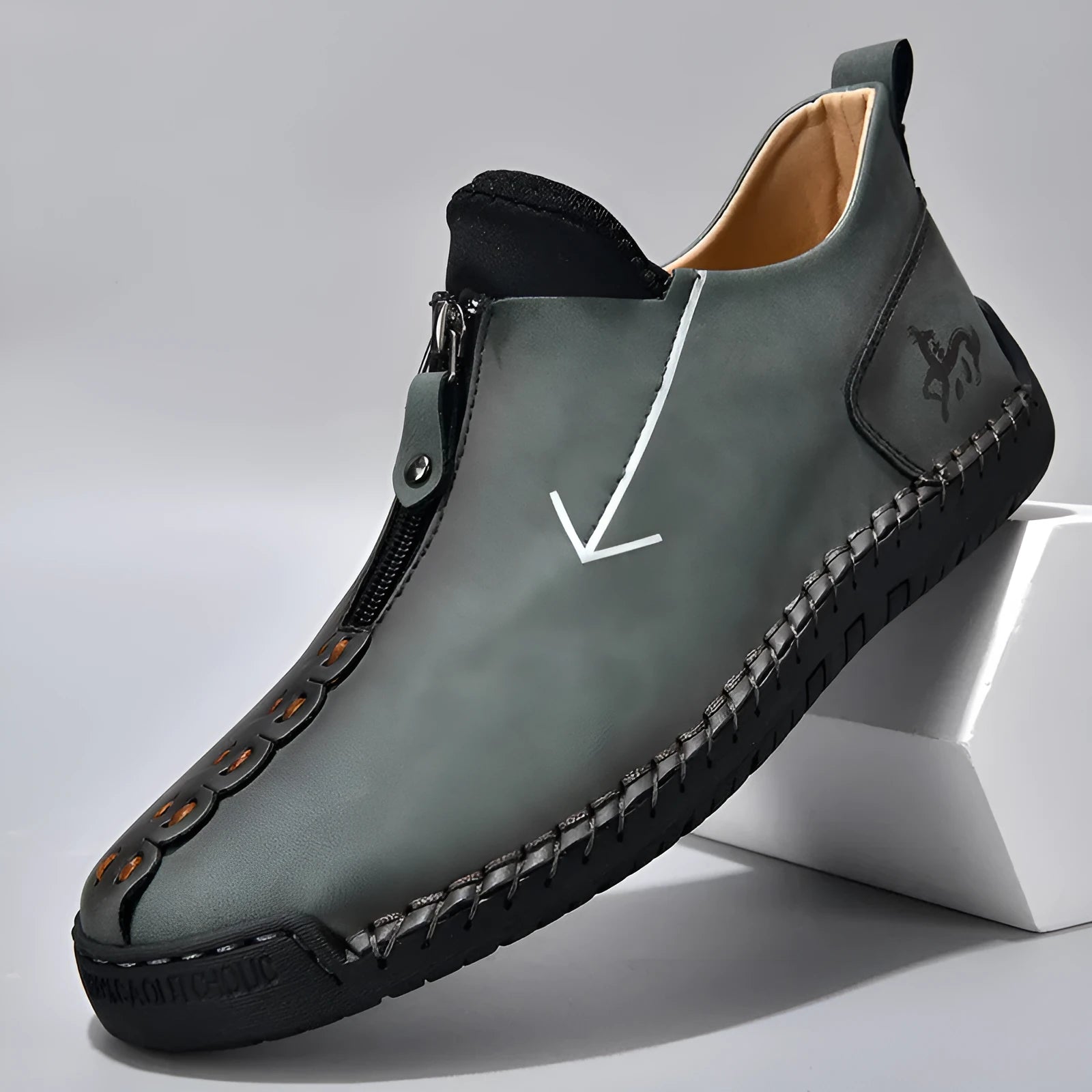 Men's brown casual leather-style boots with a front zip, round toe, and mid-calf height.