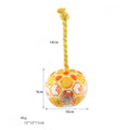 Blue and yellow elastic football tug of war dog toy with cotton rope ball for interactive play