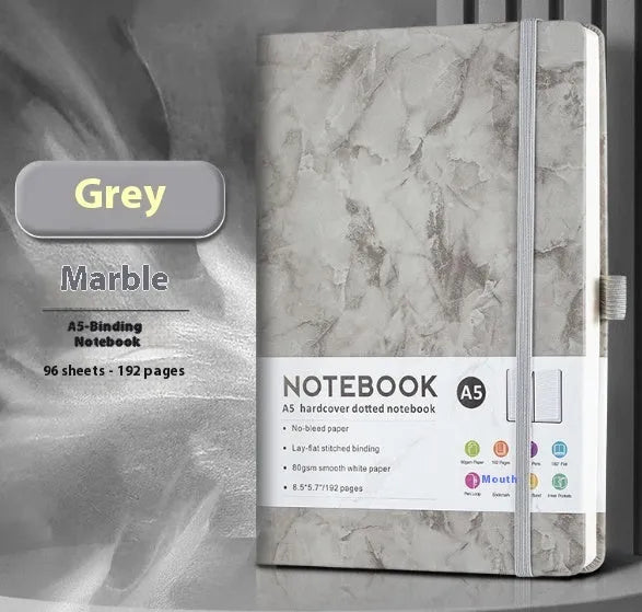 A5 office diary with hand skin feeling PU leather cover and strap closure, open to show horizontal line pages.