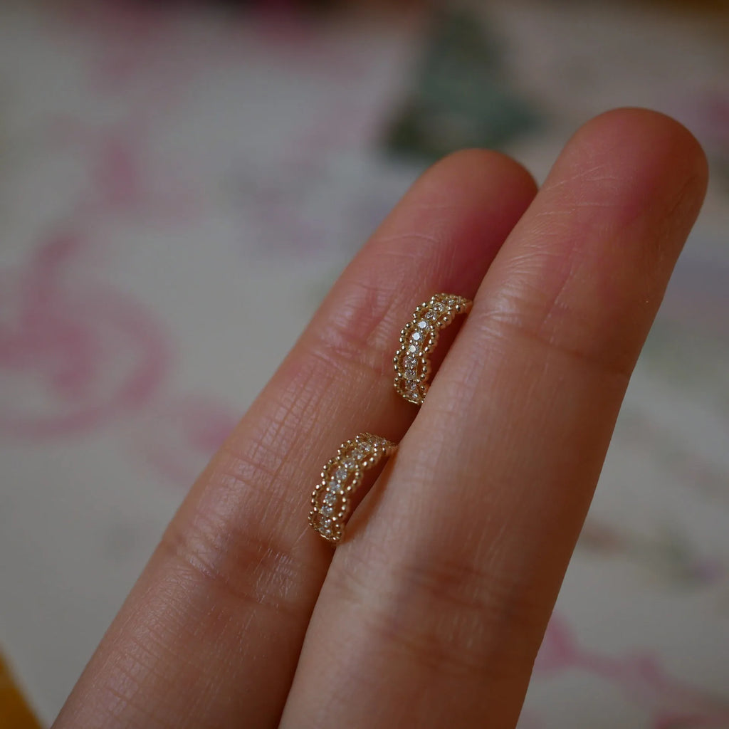 Small gold lace bone stud earrings with clip backing, made from 925 silver.
