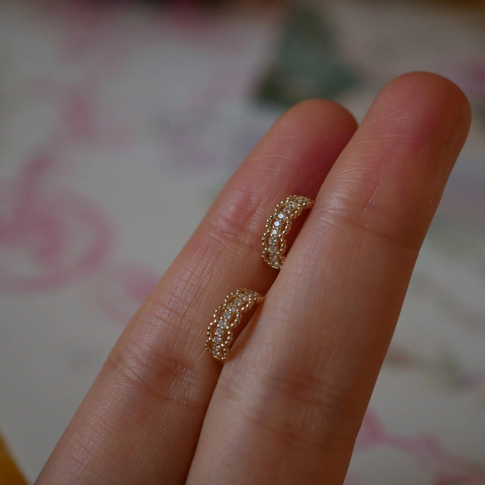 Small gold lace bone stud earrings with clip backing, made from 925 silver.