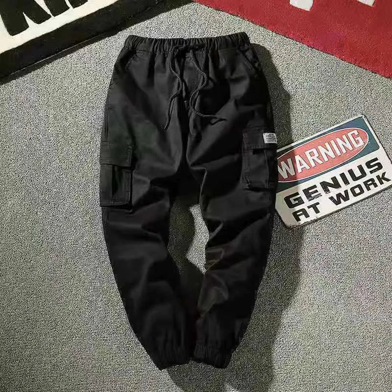 Men's loose-legged cotton casual trousers in camouflage and solid colours, sizes S to 7XL.