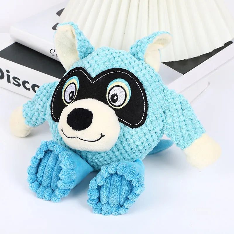 Bite resistant dog plush toy for tooth cleaning measuring 27x24cm in blue, gray, orange