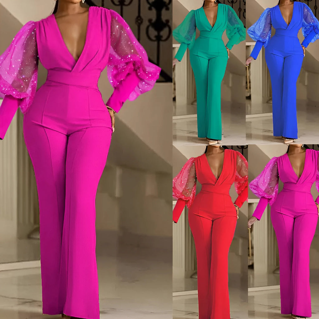 Red women's jumpsuit with mesh stitching on long sleeves, elastic waist, and wide-leg trousers on a model.