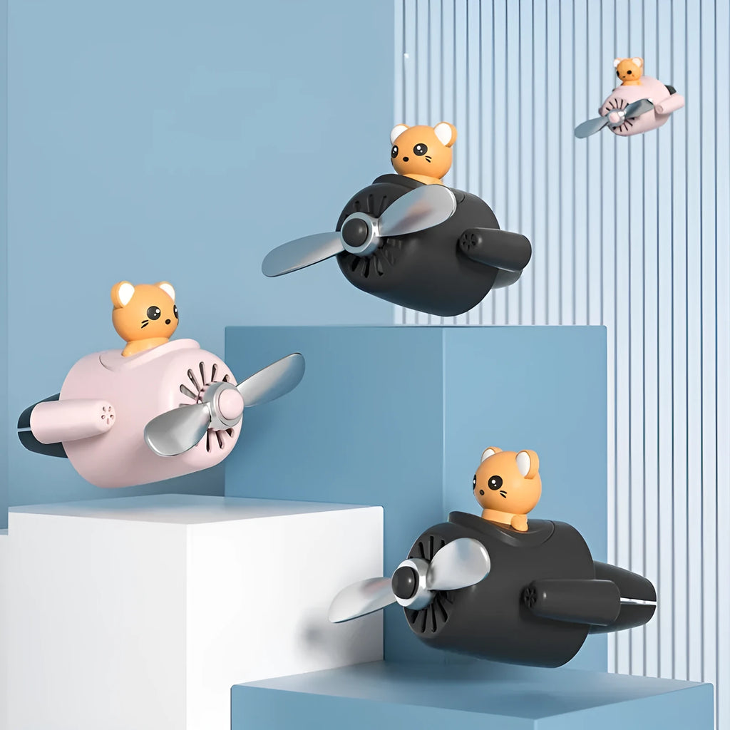 Cartoon airplane shaped car air freshener with vent clip mounting and fragrant slices