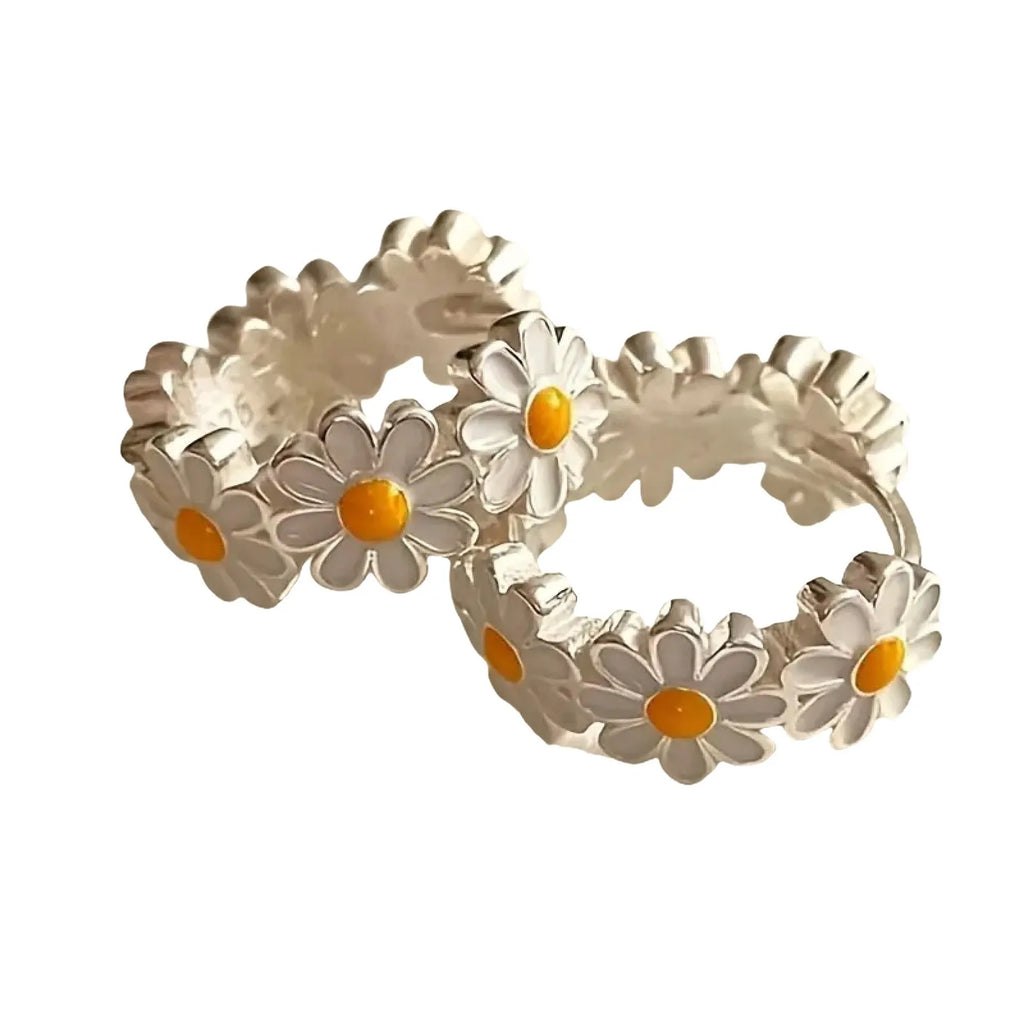 White daisy flower fashion earrings with platinum gem setting on copper construction