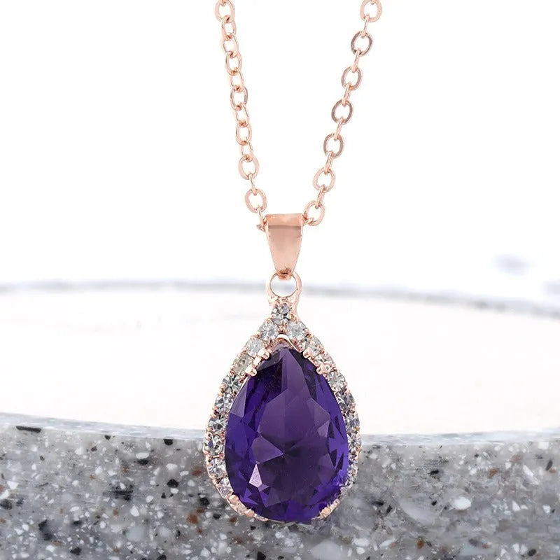 Rose gold water drop necklace with geometric rhinestones in pink colour