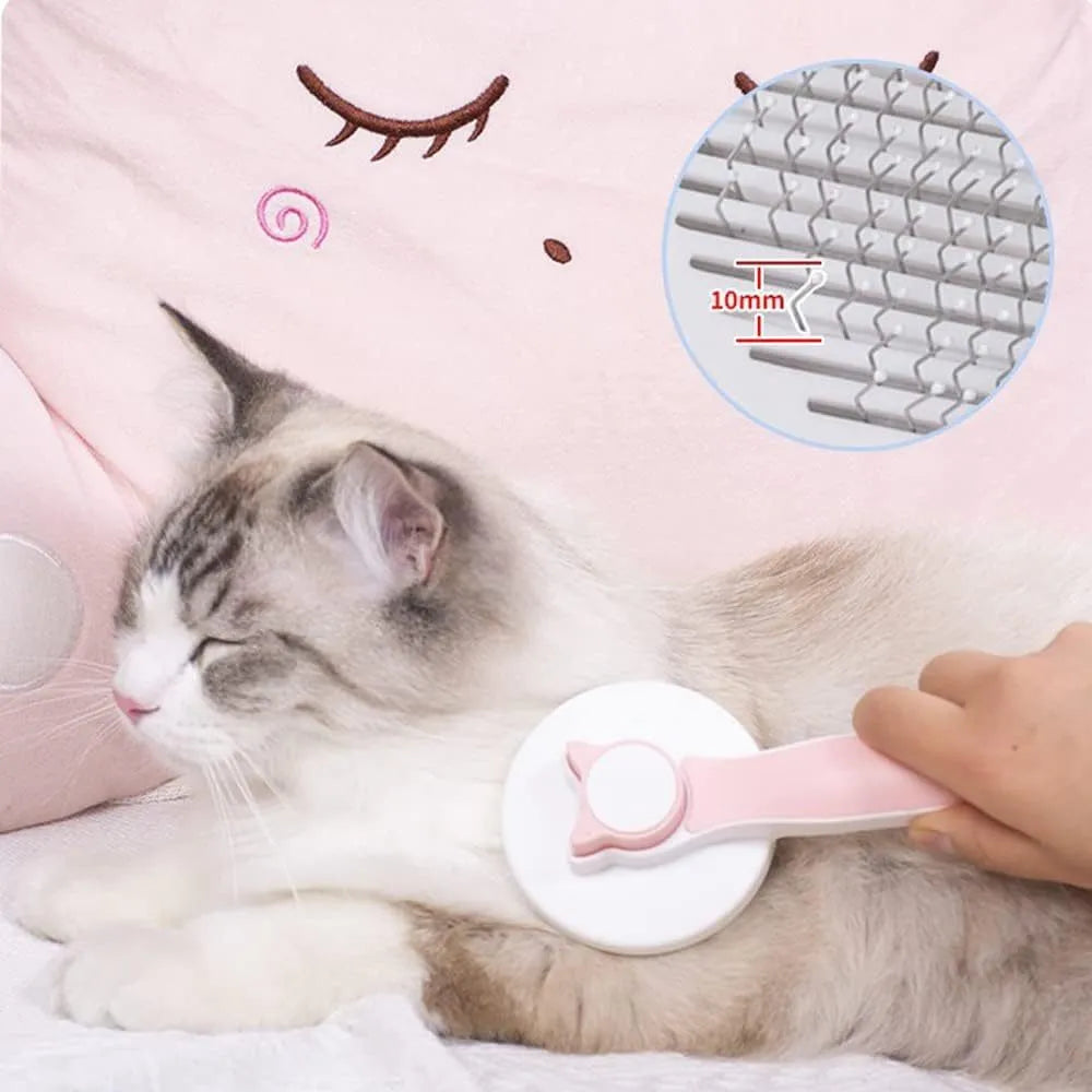 Blue self-cleaning cat brush with rubber-tipped pins and a one-click button on the handle