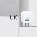 White portable USB phone charger with built-in US EU UK adapter plugs showing compact dimensions