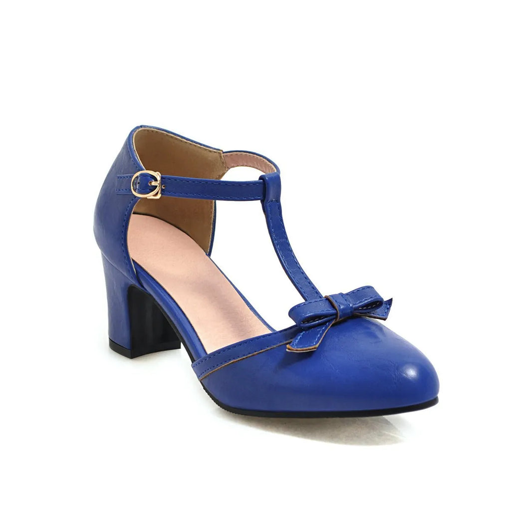 Women's apricot chunky heel sandals with hollow-out round toe, bow detail, and a buckle strap on a 6.5cm heel.